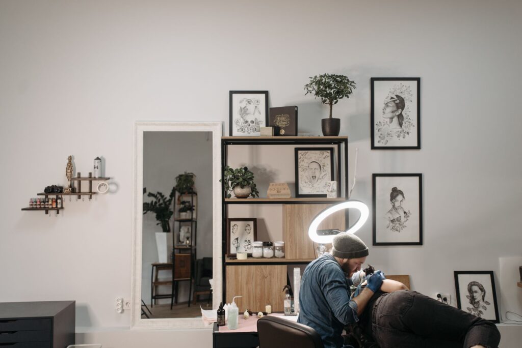 Professional tattoo studio workspace with sterilized equipment and supplies