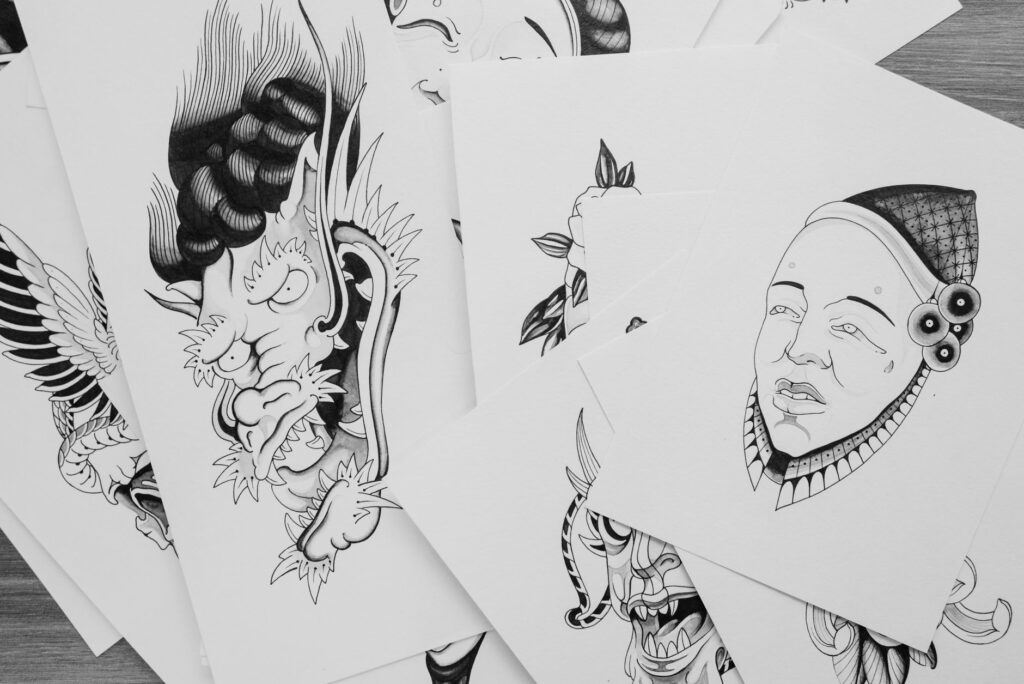Display of ready-made tattoo flash designs available for immediate booking